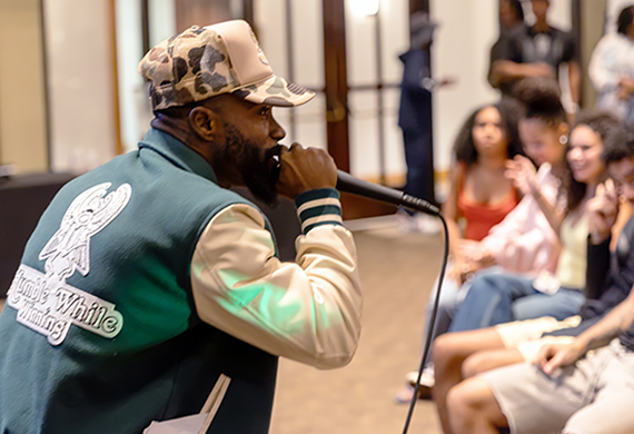 Image of Curtis Luck (D'Luckz) performing at the Next LVL Live open mic and meet and greet event in the Cabaret. Photo by Aiden Colby, Forge Media.
