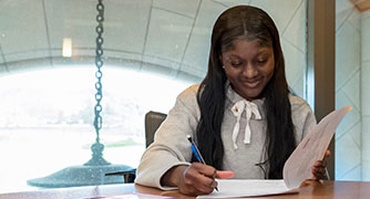 An image of student studying on campus.