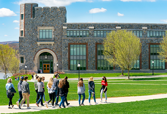 An image of students walking on a campus tour. 