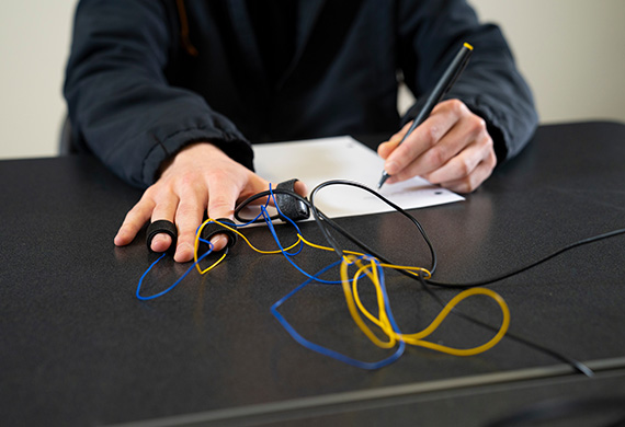 Image of a psychology student using neurological equipment