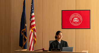 image of marist student in mock-court room