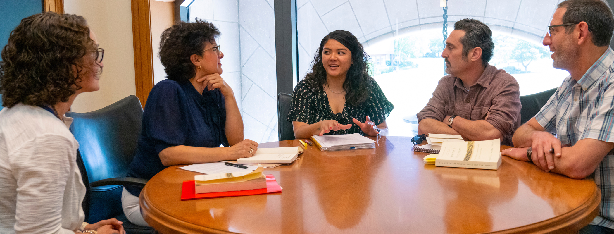 Image of faculty in conversation.