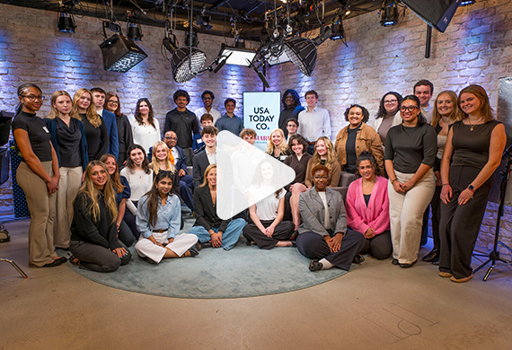 Image of students with Lark-Marie Anton at USA Today studio with