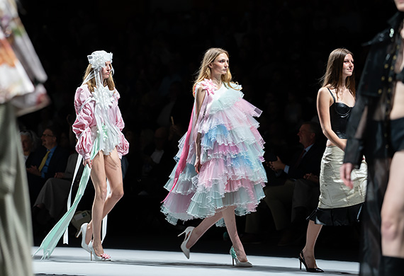 Image of Silver Needle Runway 40 showcasing student designs at the large-scale, student-produced event in McCann Arena. Photo by Benson Delaney ’27/Marist University.