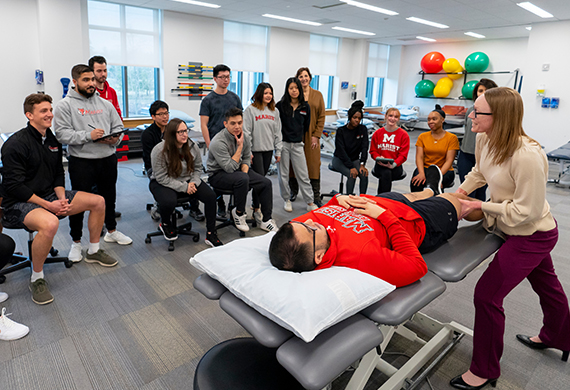 Image of students working in the Doctor of Physical Therapy Lab at the Science and Allied Health Building.