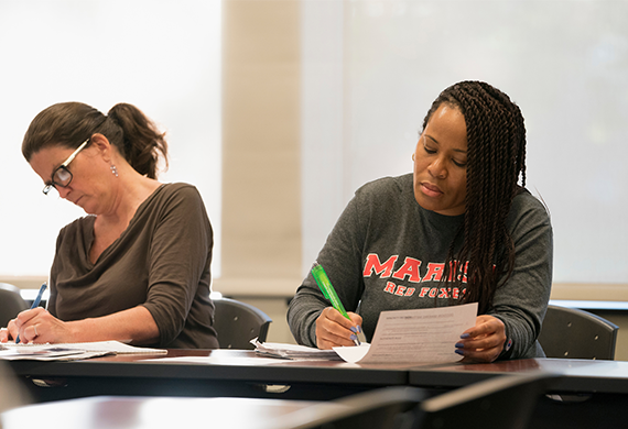 An image of adult students in a classroom.