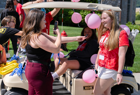 image of Megan Dwyer with Marist Student