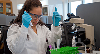 Photo of student in science lab