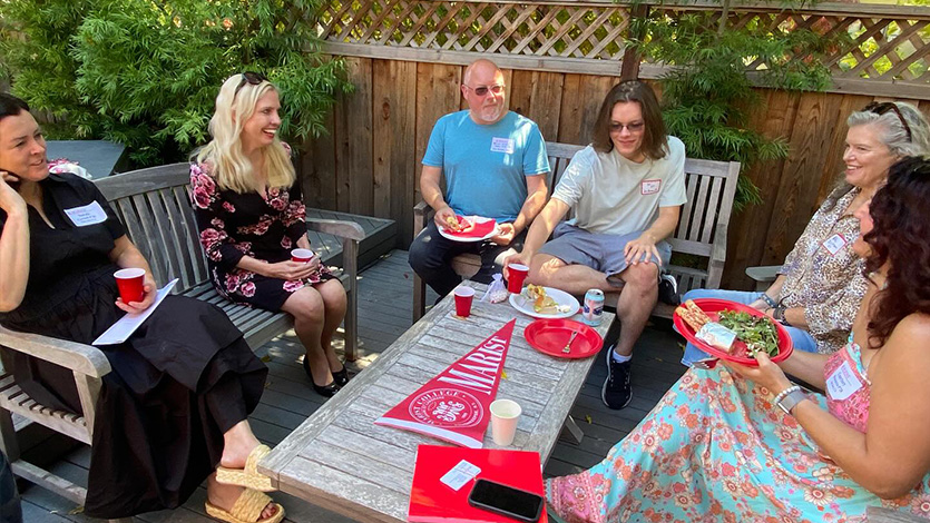 Image of Marist staff and alumni meeting incoming first year students in Northern California.