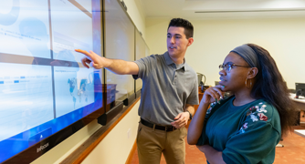 Image of students working in the Cybersecurity Operations Center.