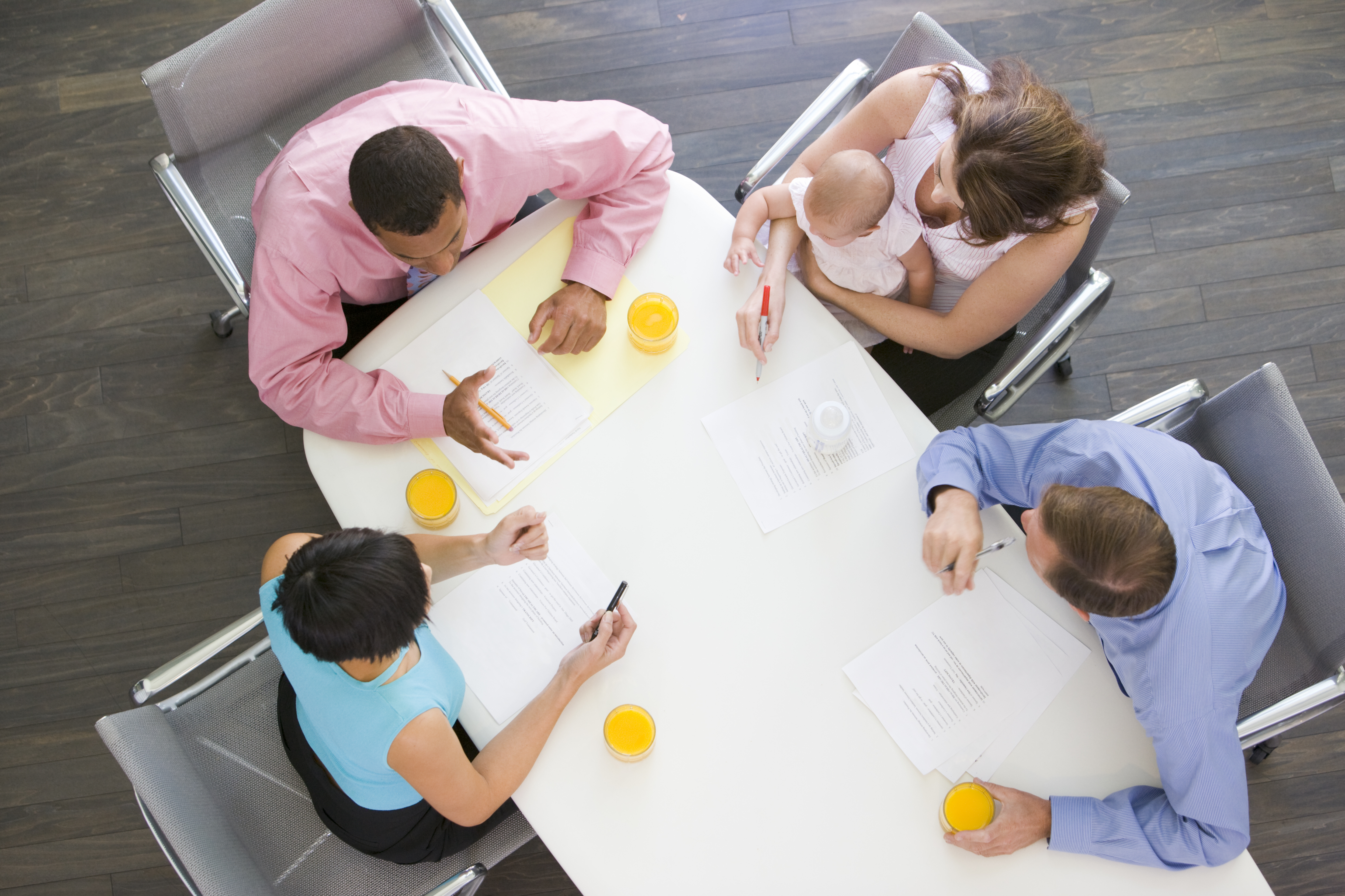 students working around a conference table