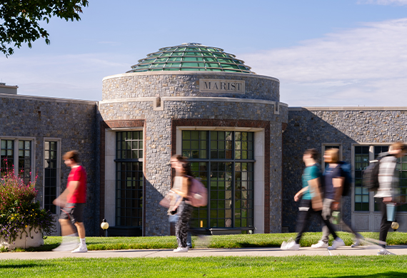 Students walking by Marist Rotunda.