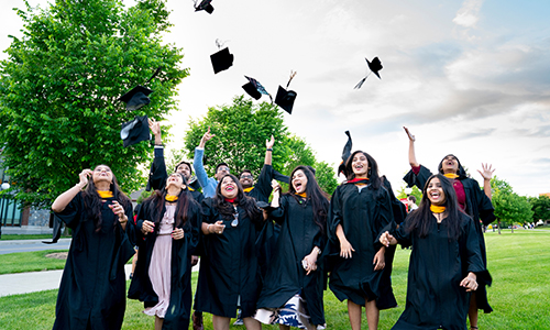 Adult students celebrating graduation