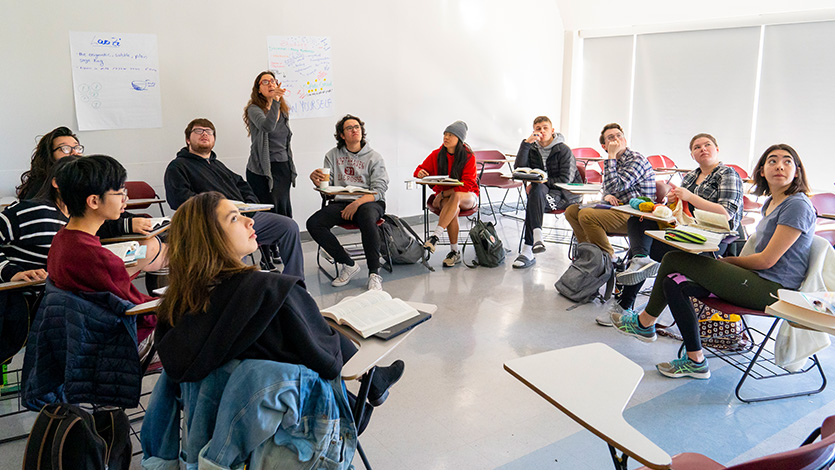 Image of students and professor in class.