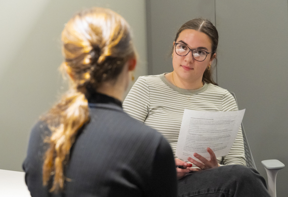 Image of School of Social and Behavioral Science students practicing social work methods.