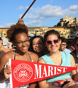 Italy students with Marist penant