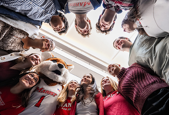 Marist students join Frankie in the Dyson Center to get ready for the 2025 Day of Giving. Photo by Nelson Echeverria/Marist University.