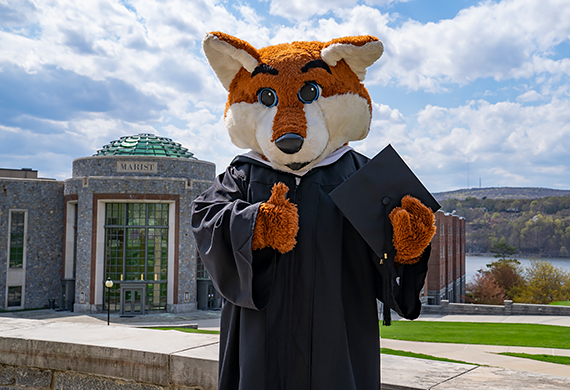 Image of Frankie with a cap and gown.