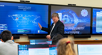 An image of a professor teaching cybersecurity.