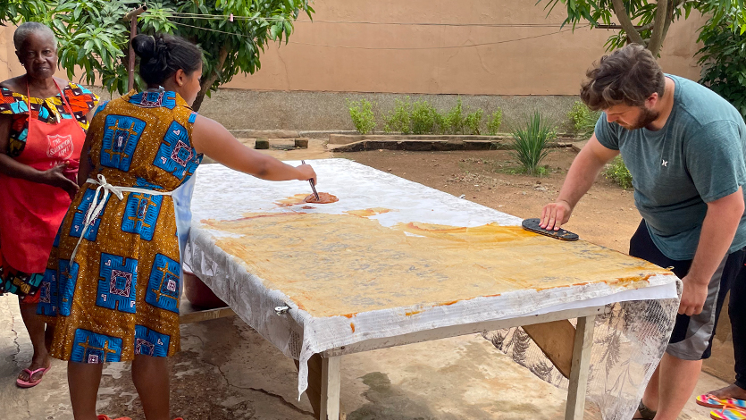 image of marist student in ghana assisting with project