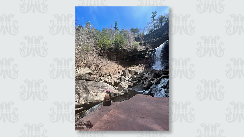 Image of Zoe Fernandes ‘24 at Kaaterskill Falls before taking a swim.