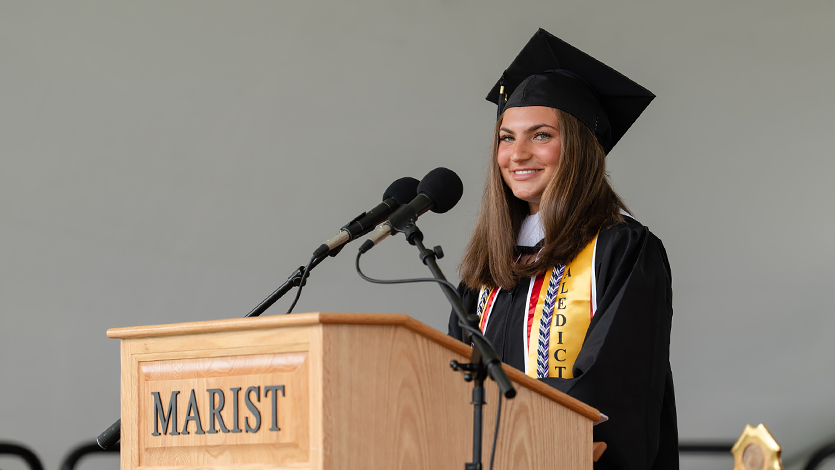Image of Valedictorian Emma Spiro addressing graduates.