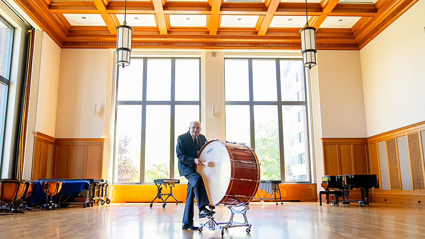 Image of Art Himmelberger playing a bass drum.