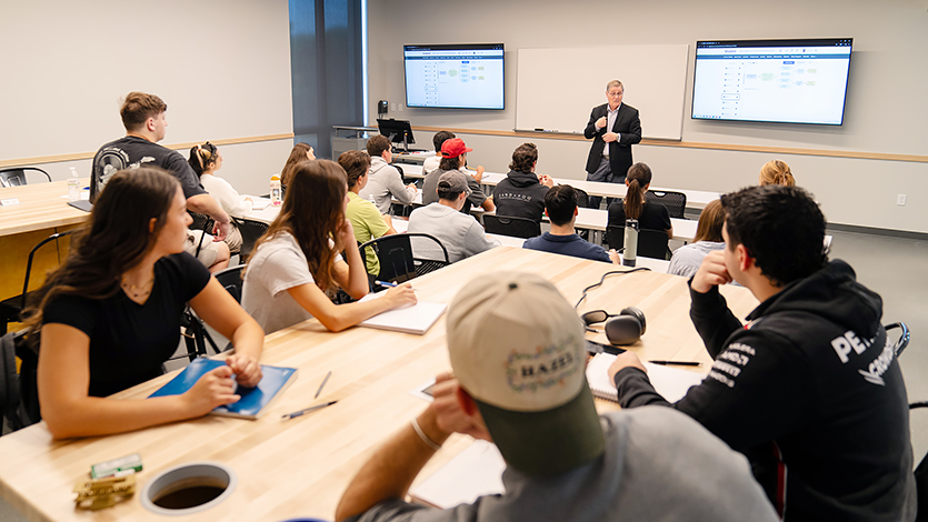 Dr. David Gavin, Associate Professor of Management leads his business entrepreneurship class in the Idea Lab, located on the second floor of the Dyson Center. 