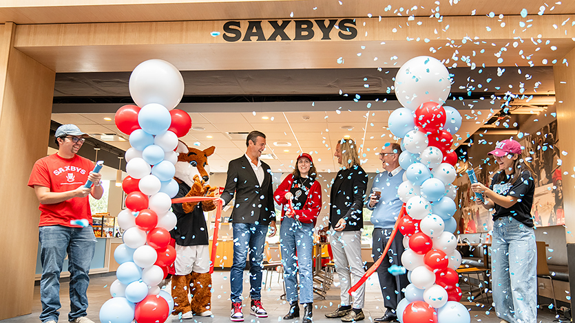 Image of Saxby's ribbon-cutting at grand opening event.