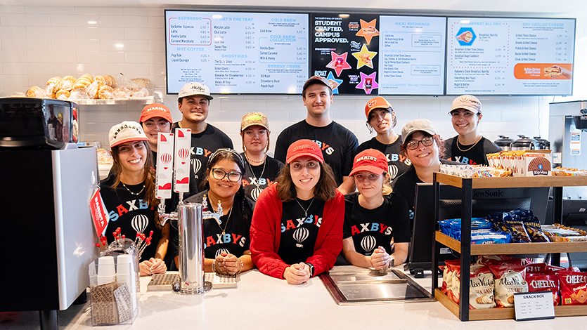 Image of the Marist Saxbys team ready for business during the grand opening event.