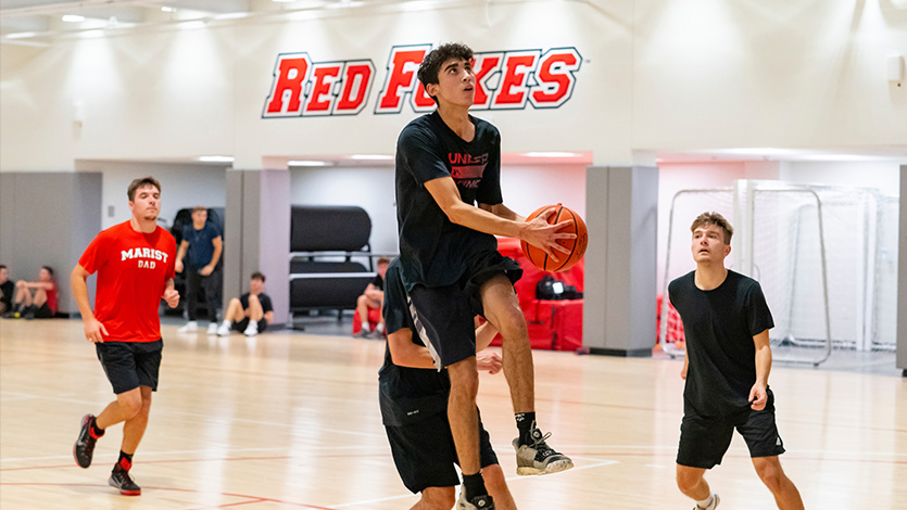 Image of students playing intramural basketball.