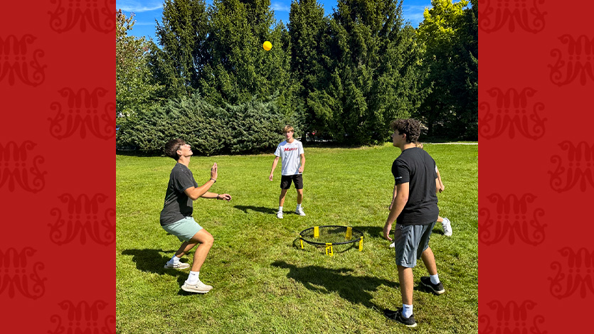 Image of students playing Spikeball.