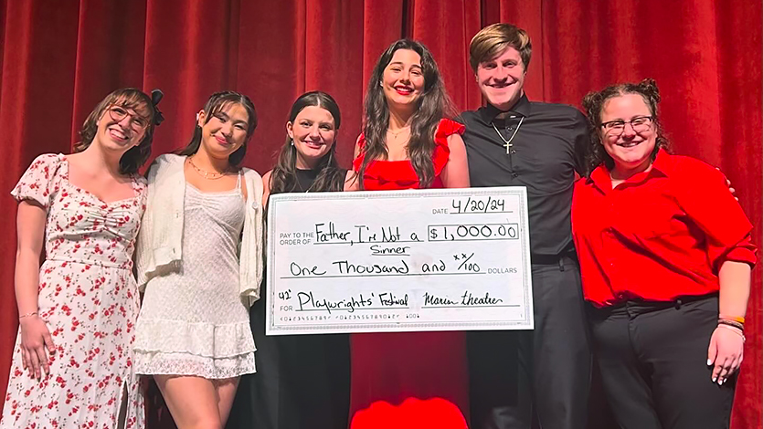 Alyssa (holding check) and the cast of her award-winning play, “Father, I’m Not a Sinner.” Photo courtesy of Alyssa Borelli.