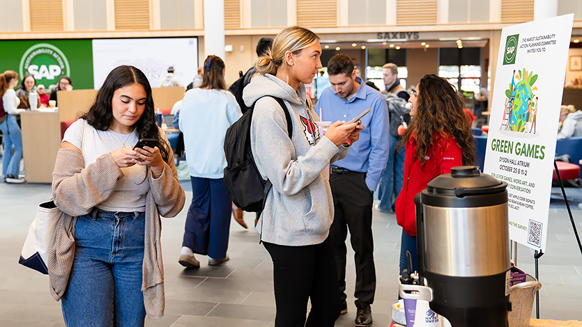 Marist students taking the SAPC survey in the Dyson Center Atrium.