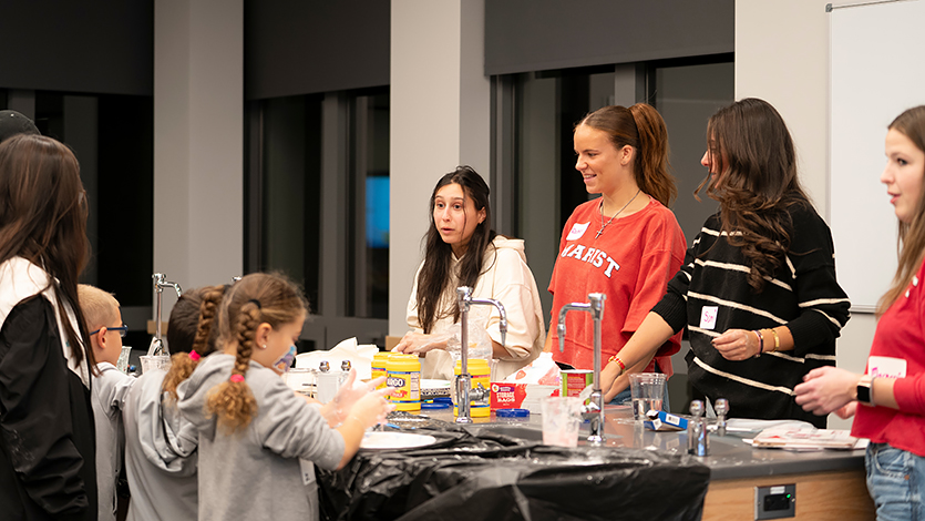 Students and future educators work in collaboration at the science lab stations inside of the new Teaching Methods Lab. 