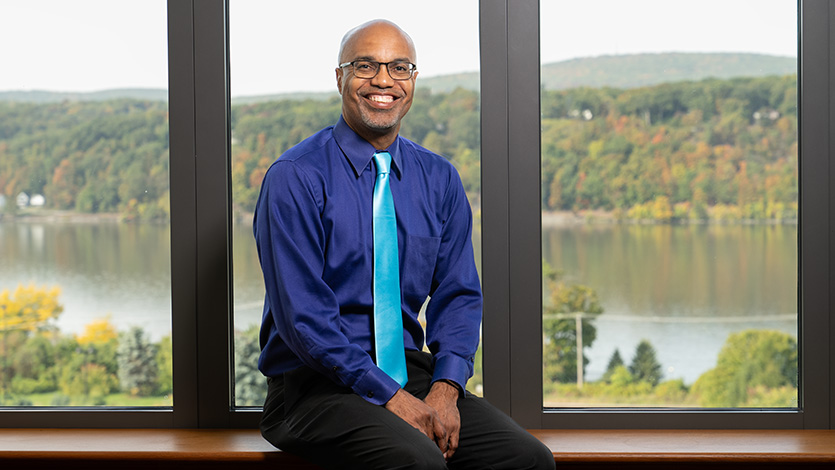 Image of Dr. Buckmire in Hancock office. 