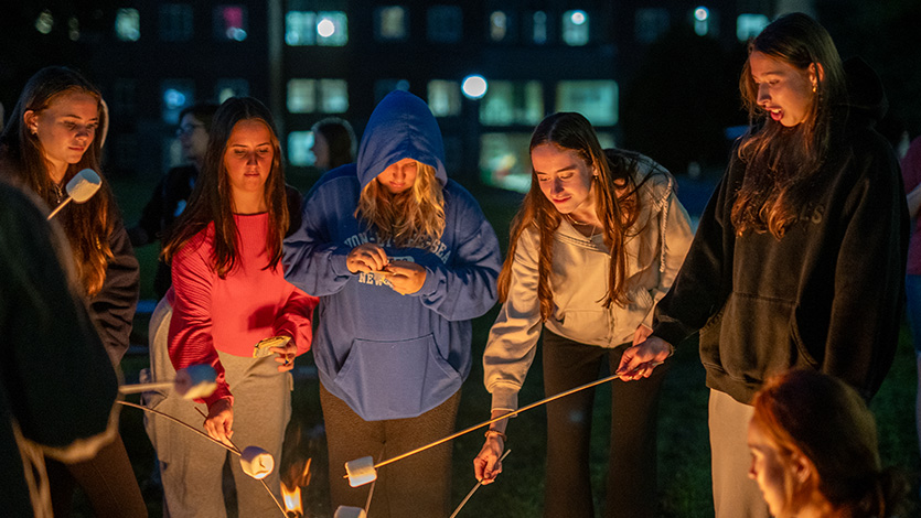 Students making s'mores.