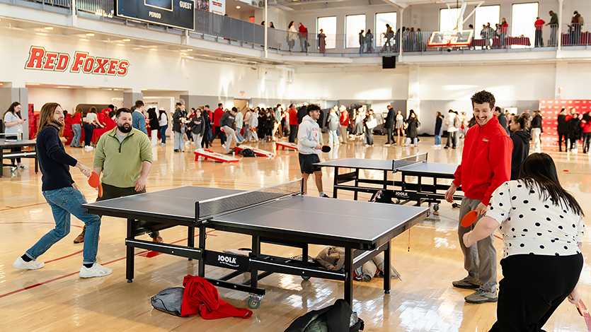 Image of students participating in recreational activities at the McCann Center as part of University Day