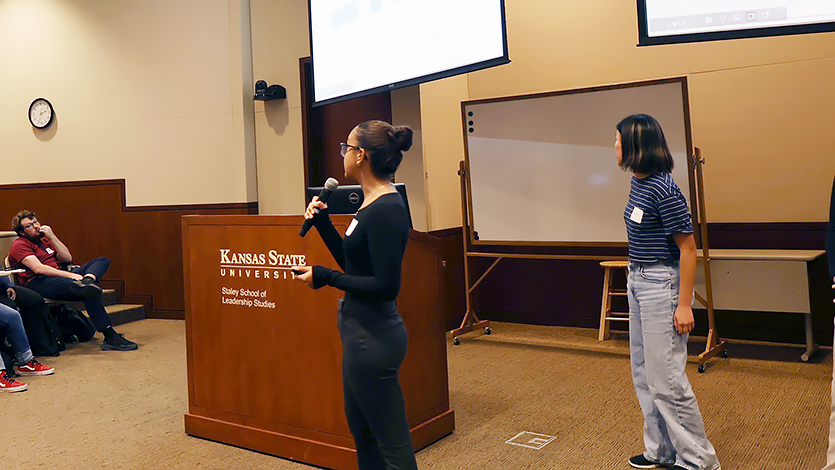 Image of Isa presents her research at the end of her Research Experience for Undergraduates to faculty at Kansas State University. 