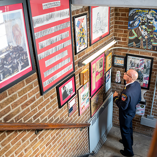 Image of Jack Oehm visiting his former firehouse.