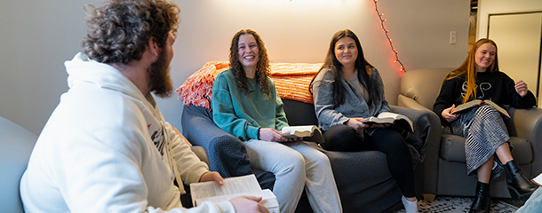 Image of Jackie Piddock with friends at a meeting of the Arise group.