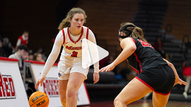 Image of Jackie Piddock playing basketball.