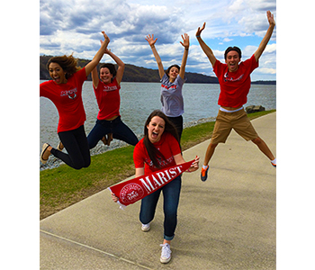 An image of a group of Marist students jumping